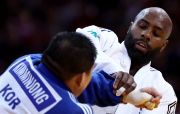 Teddy Riner remporte son 8e titre au Paris Grand Slam, Dicko également couronnée d'or