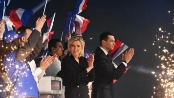 Le Rassemblement national en tête des sondages électoraux de l'UE face aux critiques de Macron