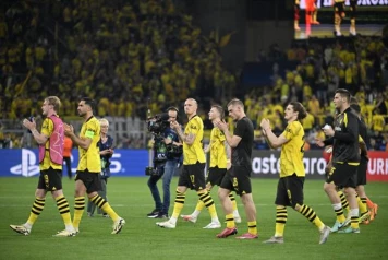 Borussia Dortmund sécurise la victoire cruciale et la qualification en Ligue des Champions