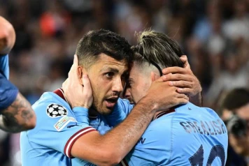 Les footballeurs de Manchester City célèbrent leur quatrième titre consécutif au Fenix