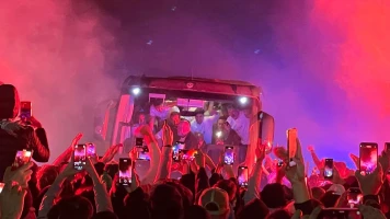 Saint-Etienne Fans Celebrate Ligue 1 Promotion with Players at Airport