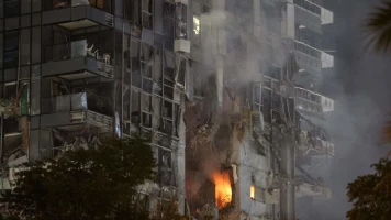 Conflit Israël-Iran : Frappes Iraniennes Causent des Blessés à Tel-Aviv